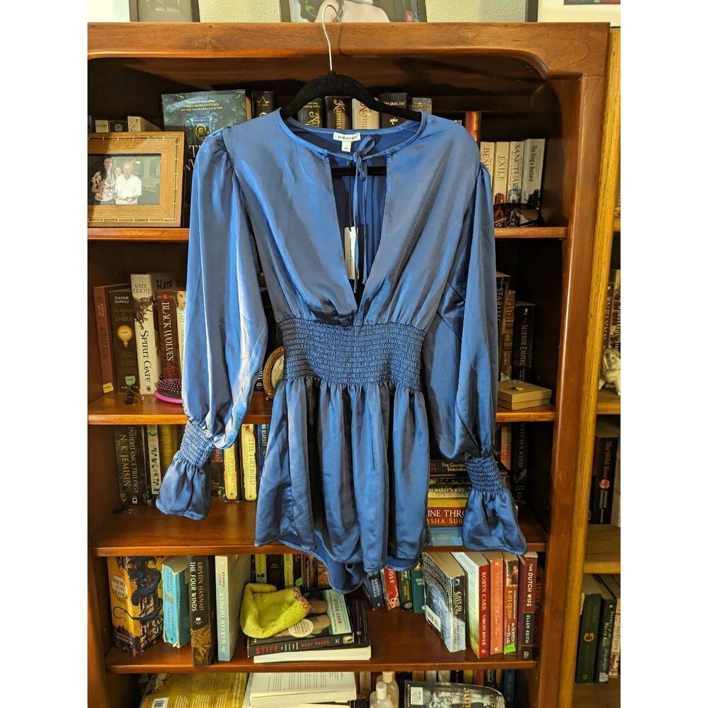 We wore what smocked sleeve satin romper sz small new with tags